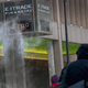 A commuter walks near a thermometer registering -18 degrees in the Loop on January 30, 2019 in Chicago, Illinois. Businesses and schools have closed, Amtrak has suspended service into the city, more than a thousand flights have been cancelled and mail delivery has been suspended as the city copes with record-setting low temperatures.